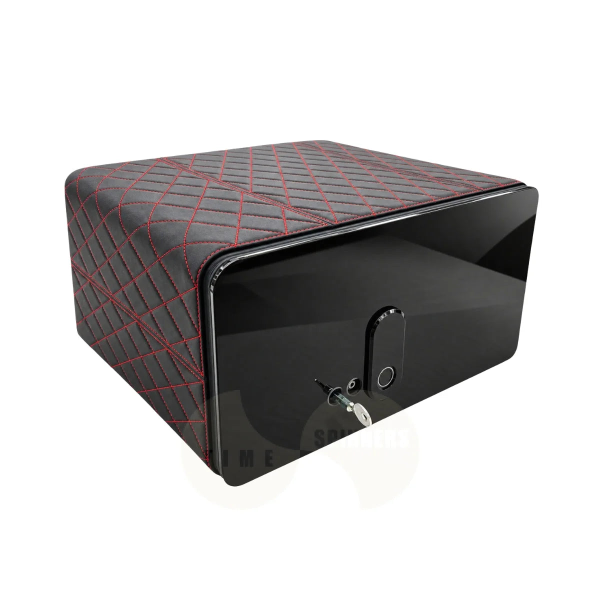 A black rectangular security safe with a glossy front door, featuring a red geometric diamond-quilted pattern on the sides and a key inserted into the lock.